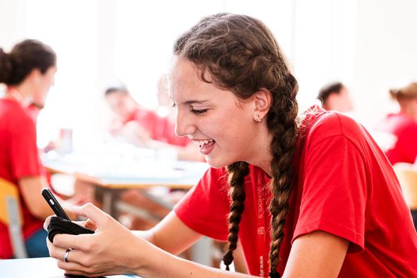 student on her phone